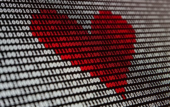 Red heart made out of binary digits illustrating the launch of Nova-3 Medical by Deepgram, an AI speech-to-text (STT) model tailored for transcription in the demanding environment of the healthcare sector.