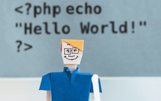 Papercraft toy with code in the background as LG AI Research has unveiled EXAONE Deep, a reasoning artificial intelligence model that excels in complex problem-solving across maths, science, and coding.