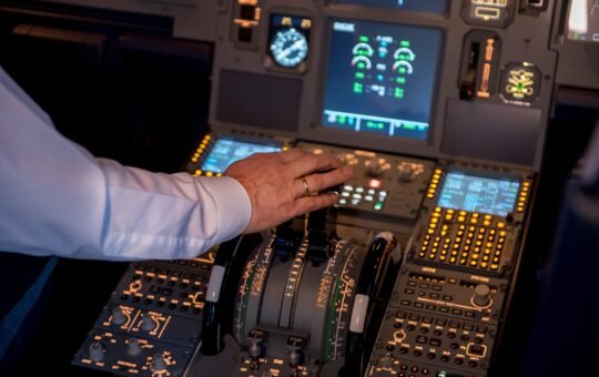 Person in a plane cockpit accelerating, illustrating ServiceNow launching its Yokohama platform which introduces AI agents across various sectors to boost workflows and maximise end-to-end business impact.