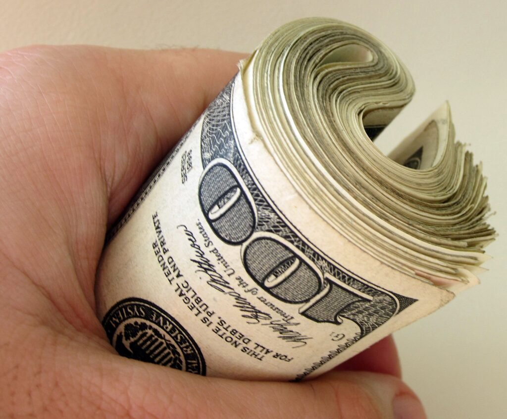 Image of bankroll to illustrate article on AI financial planning.