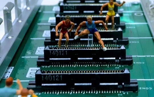 Figures hurdling on a computer board as while politicians tout AI’s promise of growth and efficiency, a new report reveals a public trust deficit in the technology.