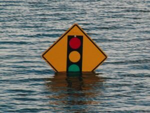 Sign in a flood as MIT engineers have built an AI tool that forecasts extreme weather without training on historical disaster data.