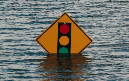 Sign in a flood as MIT engineers have built an AI tool that forecasts extreme weather without training on historical disaster data.